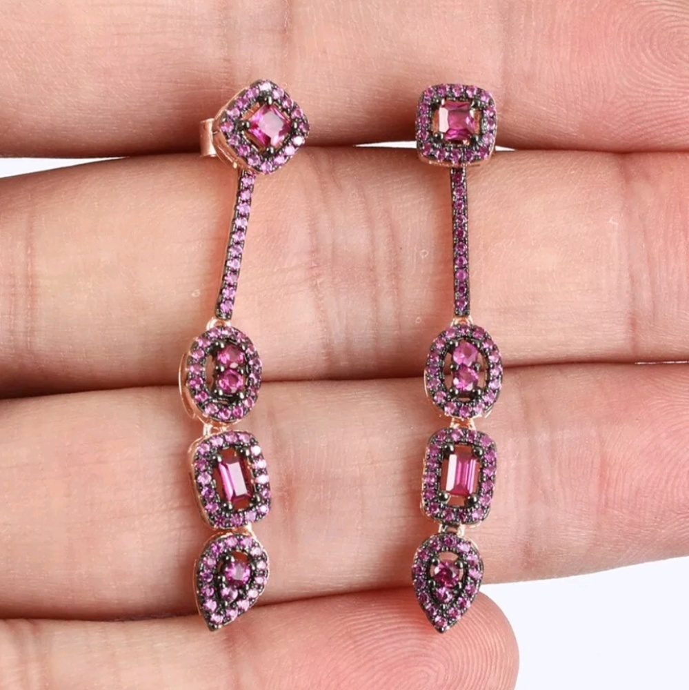 Dramatic ruby draped squares earrings